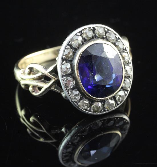An early 19th century style gold, synthetic sapphire and diamond ring, size K.